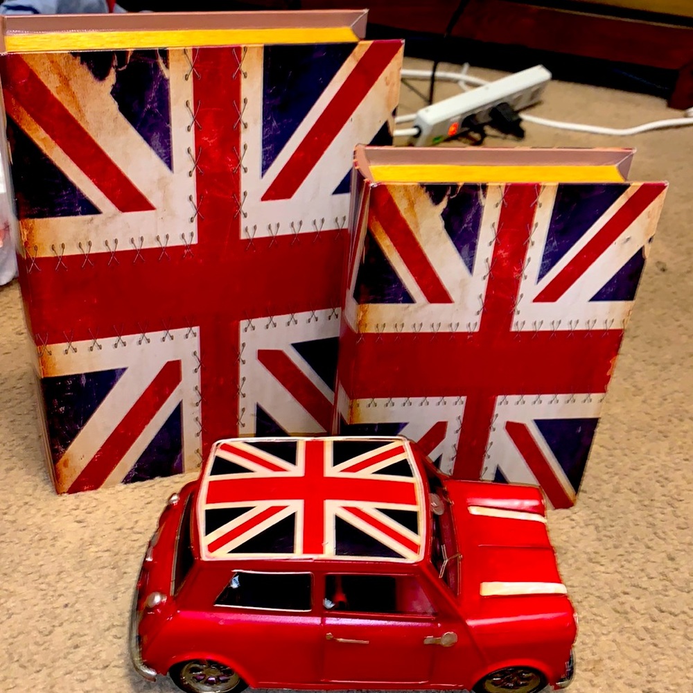 British metal 1960s car, with 2 British flag storage boxes that look like books